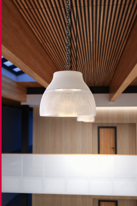 A frosted pendant light hanging from a wooden ceiling in a modern interior setting.